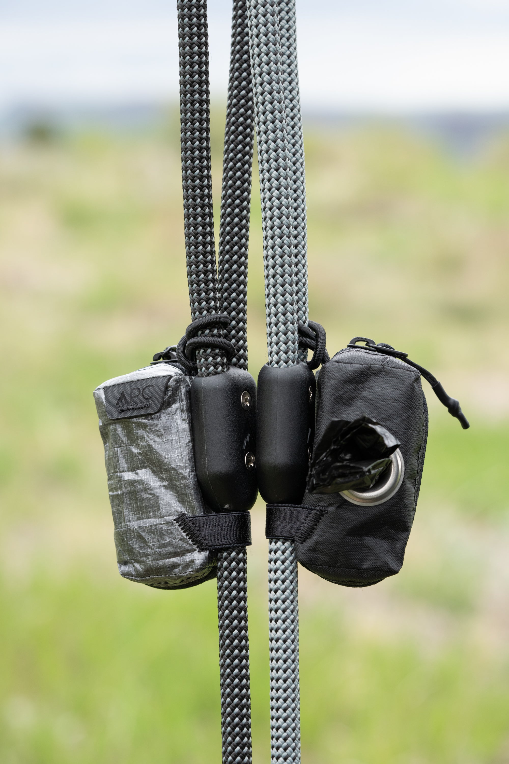 atlas pet company lifetime pouch made with dyneema in charcoal and black on lifetime leash to easily carry poop bags 